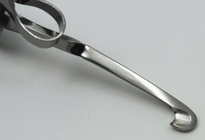 A pair of scissors sitting on top of a table.