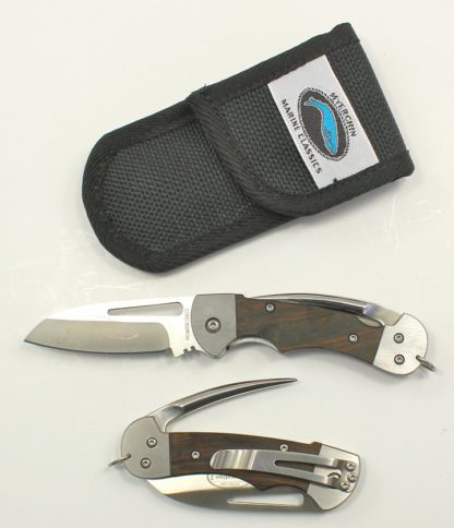 A knife and a pocket knife are shown in front of each other.