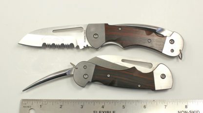 A knife with a wooden handle and a metal blade.