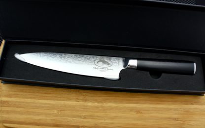 cropped knife in case with wooden table