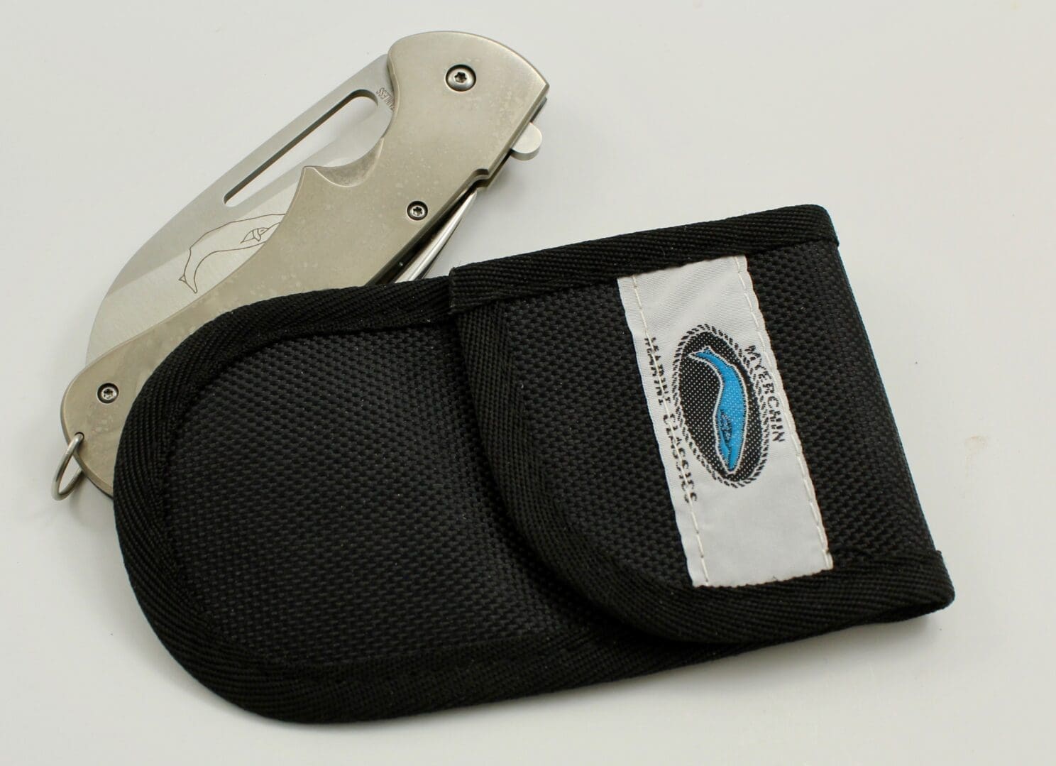 Folding knife with black nylon pouch