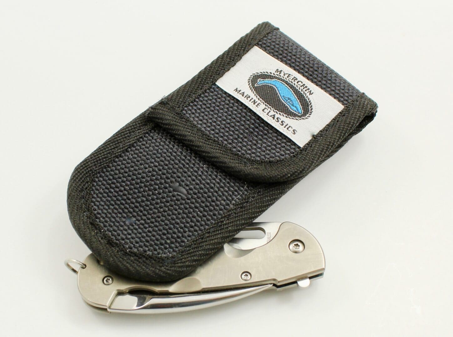 Folding knife with fabric pouch