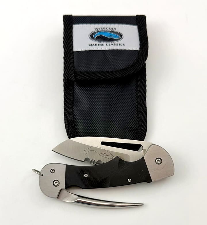 Folding knife with black handle and marine pouch.