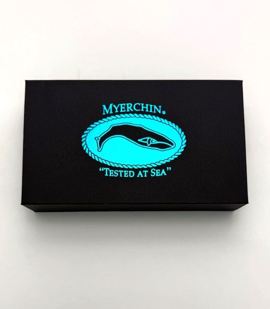 Myerchin box with glowing whale logo design.