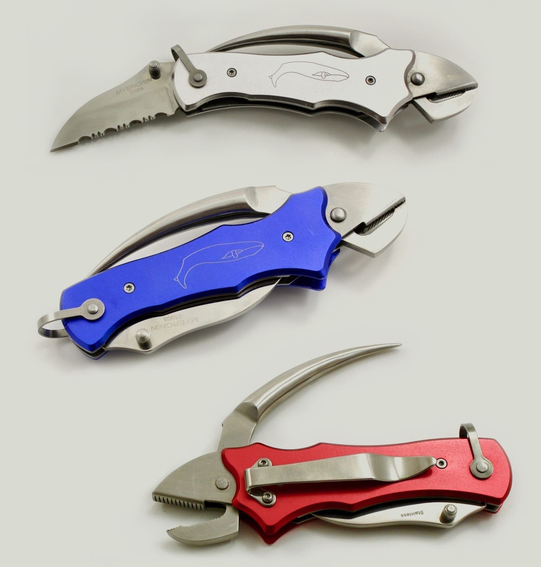 Three multi-functional folding knives in vibrant colors.