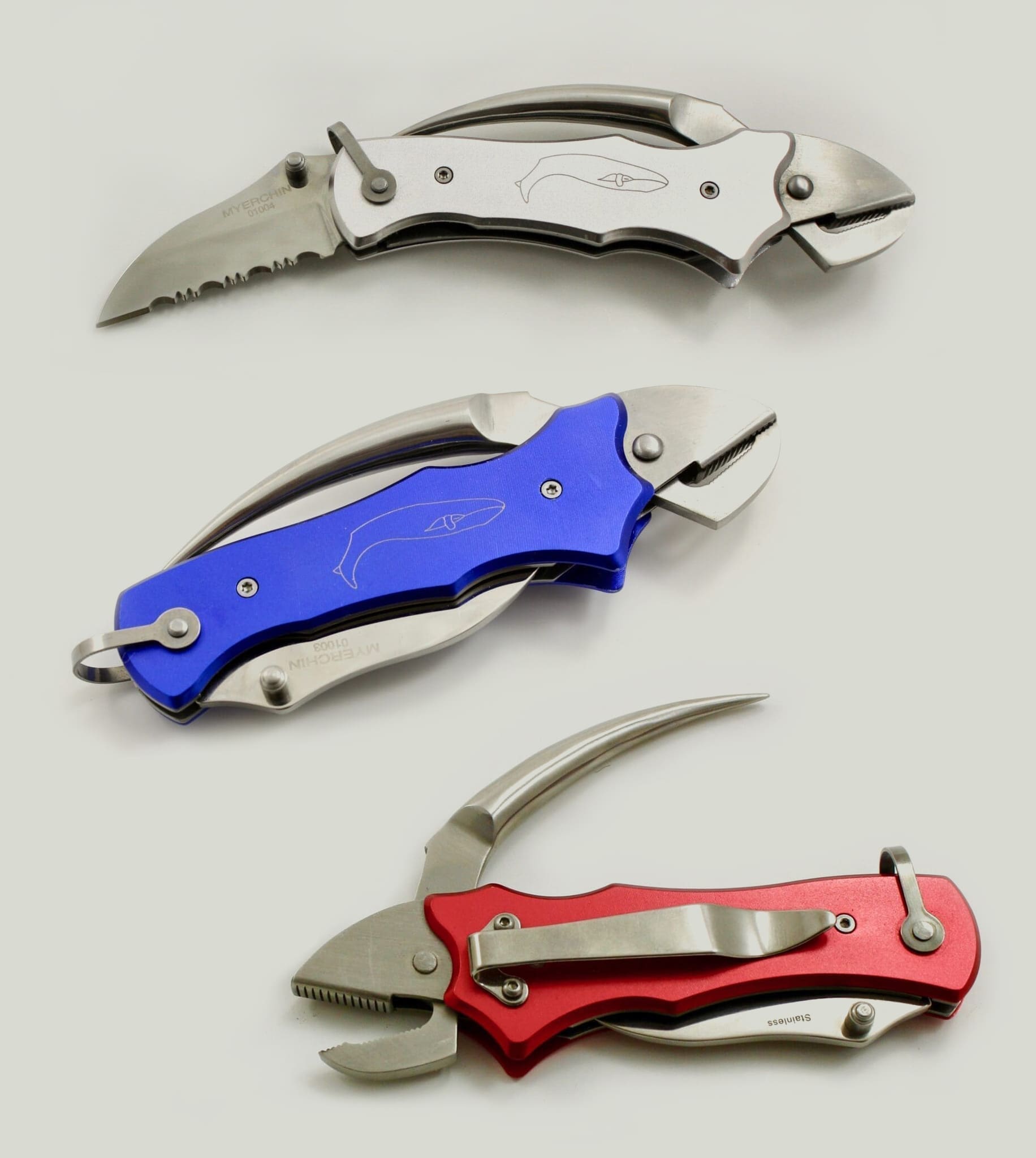 Three multi-functional folding knives in vibrant colors.